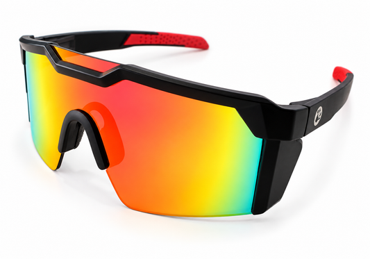 Three-quarter view of NAVAIL protective sunglasses with a rainbow mirror lens and red temple accents.